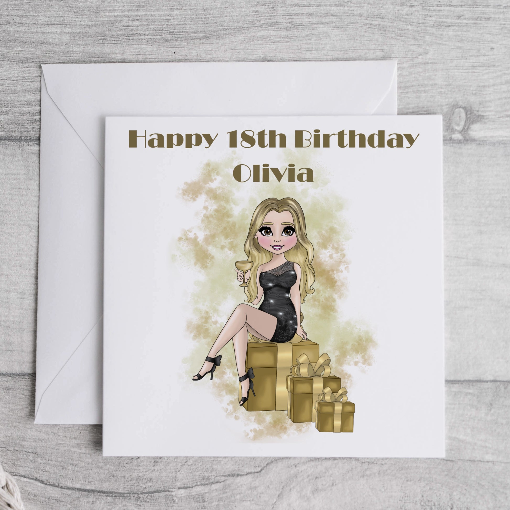 Printed personalised card featuring a girl in a cocktail dress holding a drink and sitting on gift boxes, in black and gold.