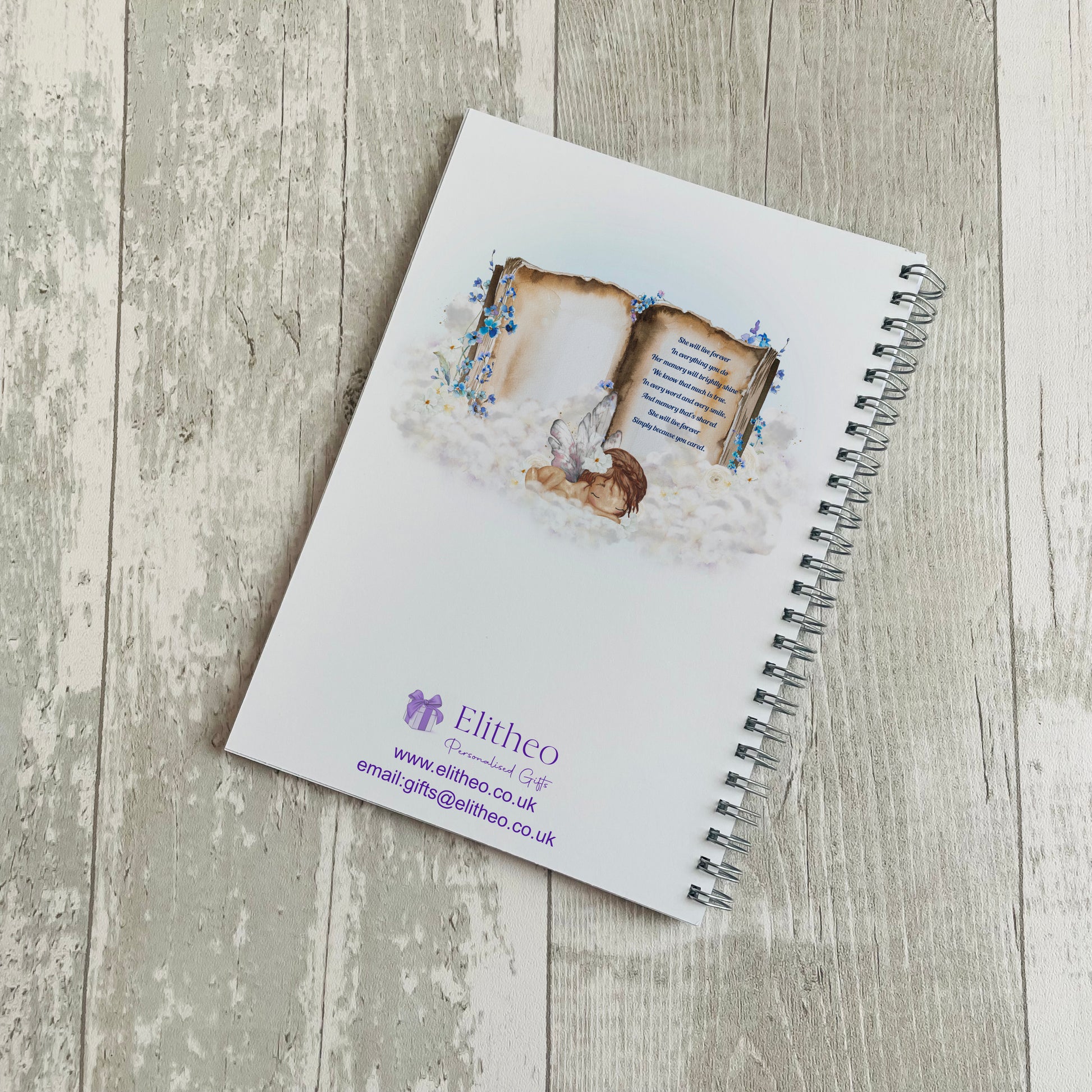 A5 memorial journal with an image of an angel baby on a book and personalised