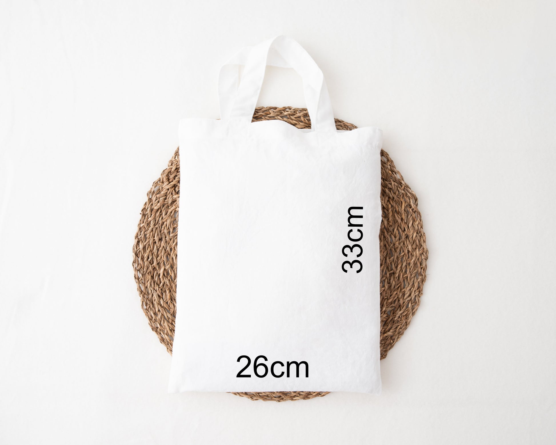 Easter egg hunt mini tote bag featuring a bunny ear rainbow in brown and is personalised